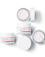 Christina Muse revitalizing night cream jars in white with pink cream texture